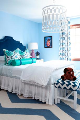 Foto di una camera da letto nei toni del blu