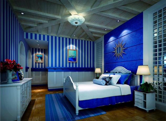 Foto di una camera da letto con una tinta blu in tutta la stanza