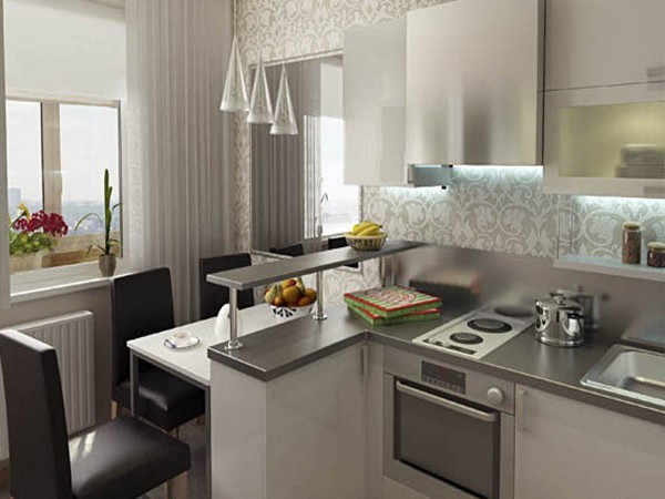Il design della cucina mostrato nella foto è un design moderno e chiarisce che un tale arredamento è buono anche per una piccola stanza.